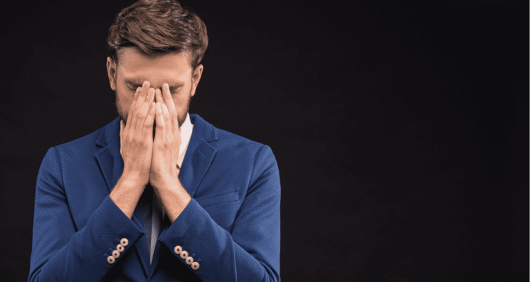 Frustrated business leader reviewing unexpected IT costs caused by changing vendor policies and poor technology standards.